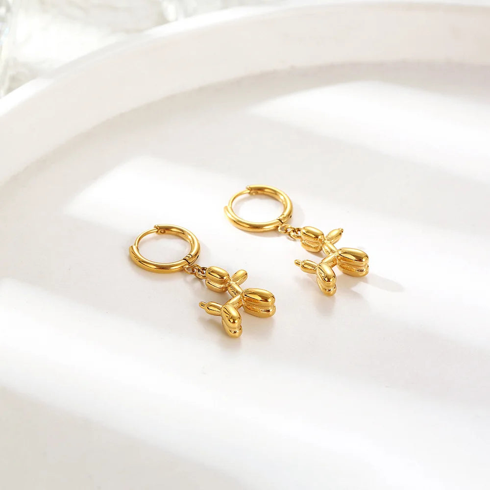 Boucles d'oreilles Huggie Or avec Mini Charme Chien Ballon