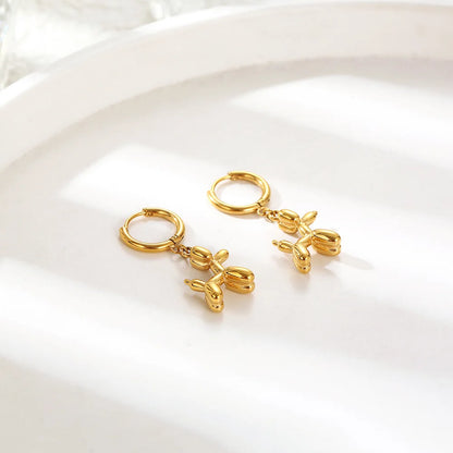 Boucles d'oreilles Huggie Or avec Mini Charme Chien Ballon