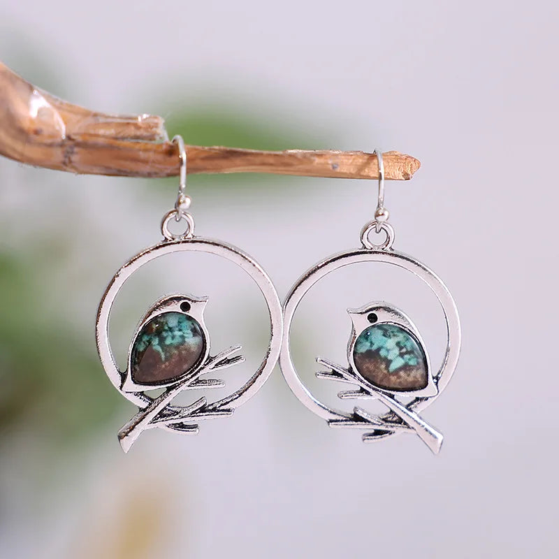 Boucles d'oreilles Oiseau sur Branche Vintage – Symbole de Liberté et de Sérénité