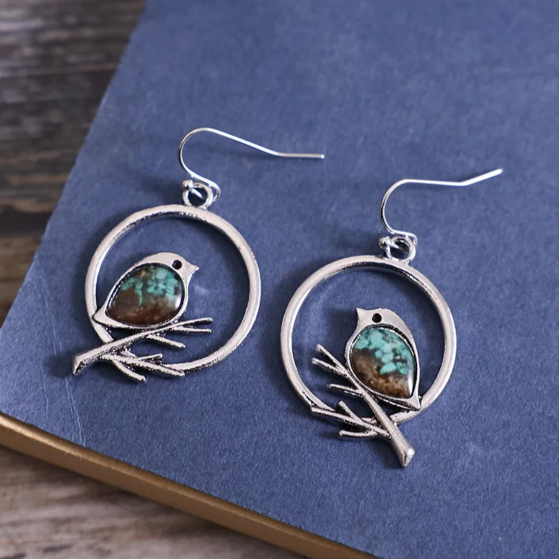 Boucles d'oreilles Oiseau sur Branche Vintage – Symbole de Liberté et de Sérénité