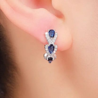 Boucles d'oreilles blason royal en saphir | Or Blanc