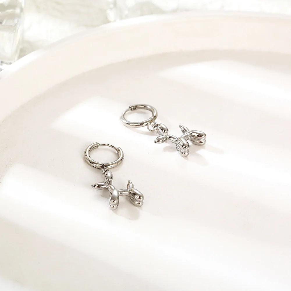 Boucles d'oreilles Huggie Or avec Mini Charme Chien Ballon