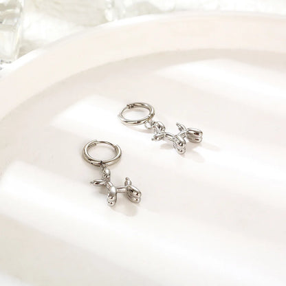 Boucles d'oreilles Huggie Or avec Mini Charme Chien Ballon