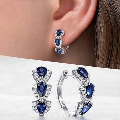 Boucles d'oreilles blason royal en saphir | Or Blanc