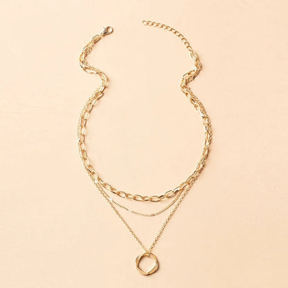 Collier vintage chaînes superposées avec pendentif