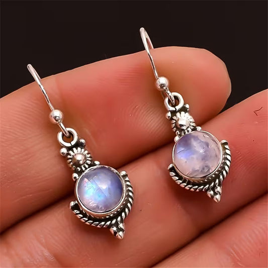 Boucles d'oreilles pendantes élégantes en pierre de lune