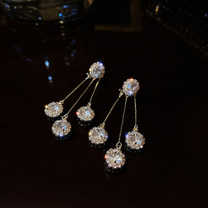 Boucles d'oreilles plaquées or Triade de zircones