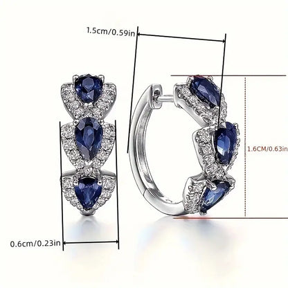 Boucles d'oreilles blason royal en saphir | Or Blanc