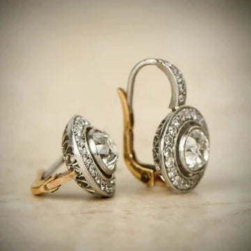 Boucles d'oreilles vintage avec cristaux en or et argent