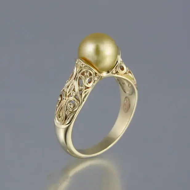 Bague vintage perle dorée
